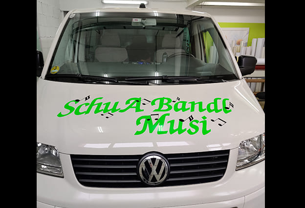 Schuabandl Musi Beschriftung