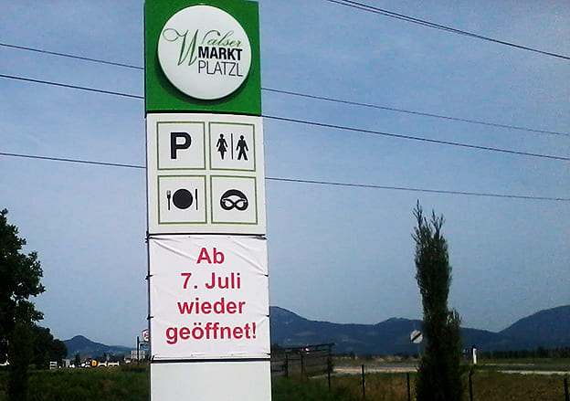 Pylonbeschriftung Walser Markt Platz